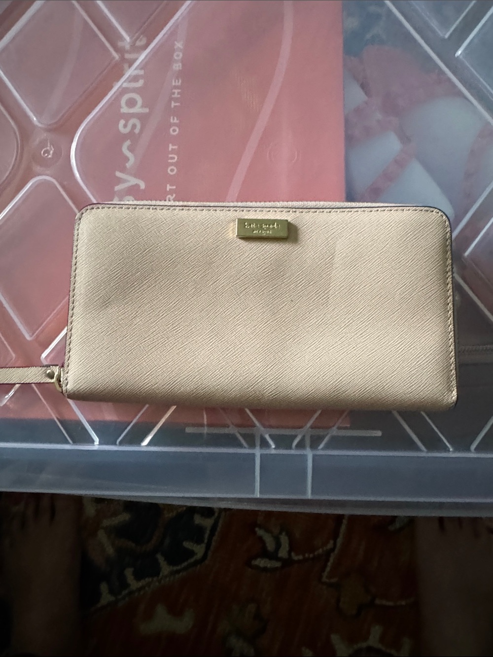 kate spade light pink zip-around wallet